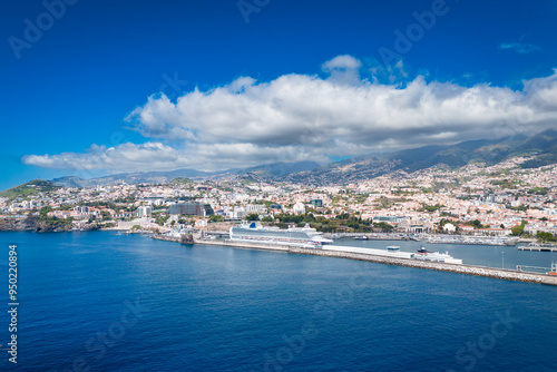 Funchal marina with cruise passenger ship moored, Madeira Island, Portugal. Aerial view