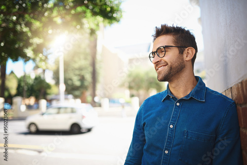 Ideas, smile and man with glasses, outdoor and happy with decision of studying in California and college. Street, thinking and person with vision for education, casual and writer with wonder in USA photo