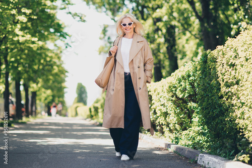 Vászonkép Full body photo of charming lovely pensioner lady spring good mood walking strol