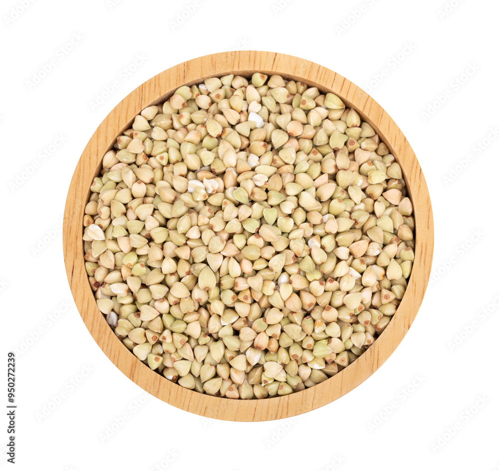 Green buckwheat in a wooden bowl ,top view Green buckwheat in a wooden bowl ,top view