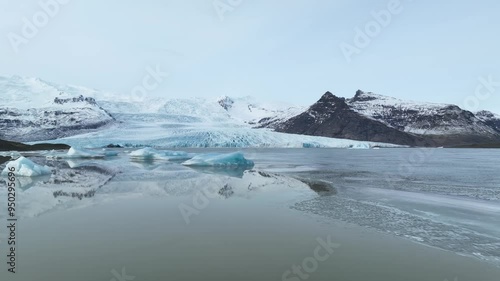 Aerial view of Fjallsárjökull glacier with icebergs and Fjallsárlón glacier lagoon, Southeast Iceland photo