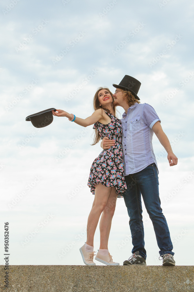 © Voyagerix - Couple flirting on date, man kissing woman © Voyagerix - Couple flirting on date, man kissing woman