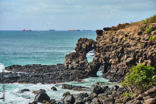 Coastline rock formations on the west part of Mauritius island, Albion, Africa photo