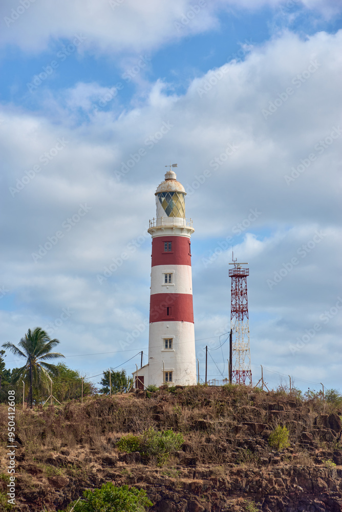 Lighthouse on a cliff during sunset in Albion, Mauritius Lighthouse on a cliff during sunset in Albion, Mauritius