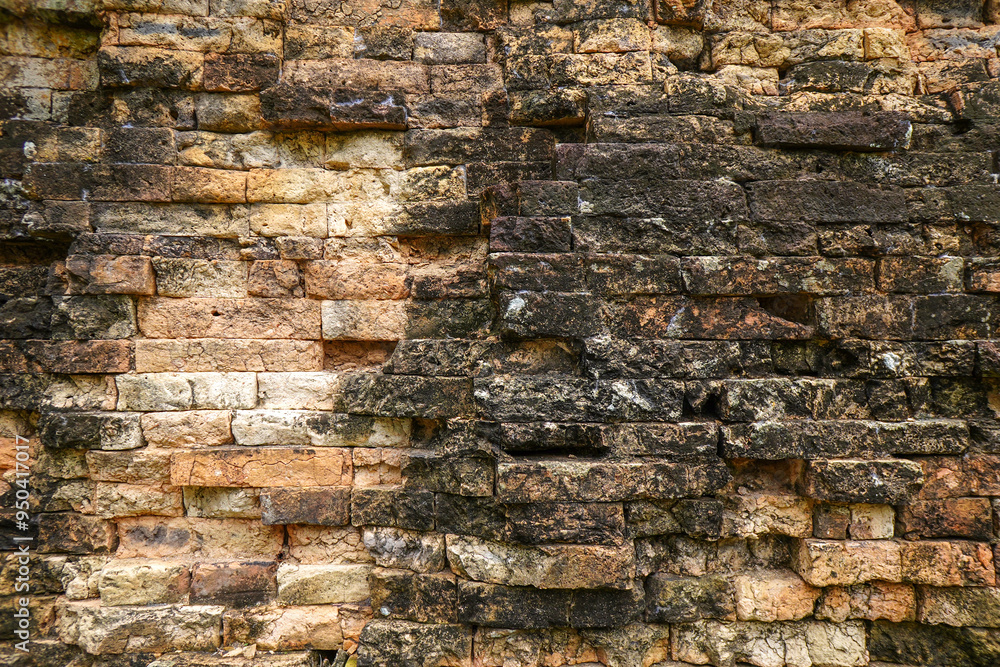 Old red black stone brick wall made with antique blocks for abstract seamless background and texture. beautiful patterns, space for work, close up. Old red black stone brick wall made with antique blocks for abstract seamless background and texture. beautiful patterns, space for work, close up.