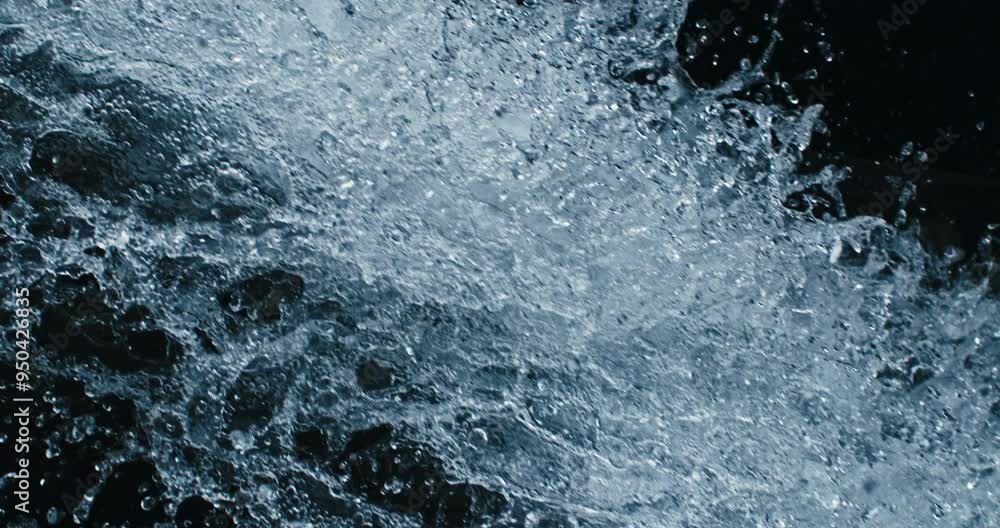 Super slow motion macro of fresh clean pure water cascade stream of old rustic wooden mill is flowing down surrounded by rocks nature at 1000 fps. Super slow motion macro of fresh clean pure water cascade stream of old rustic wooden mill is flowing down surrounded by rocks nature at 1000 fps.