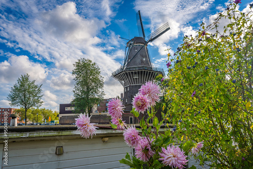 Photography Dutch windmill De Gooyer in Amsterdam in the summer, National Monument and the t