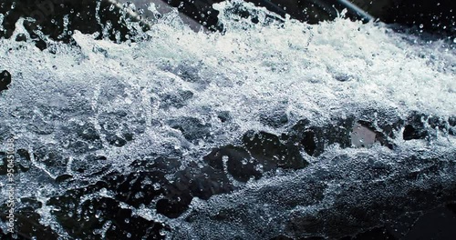 Wallpaper Mural Super slow motion macro of powerful river flowing stream of cold fresh pure water crushing waves with splashing drops perfect for extreme sports as kayak rafting, filmed at 1000 fps. Torontodigital.ca