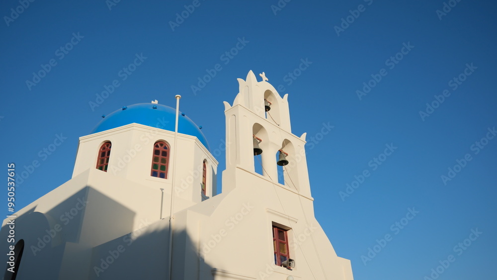 Fototapeta premium Eastern Orthodox or Greek Orthodox cathedral, Oia, Santorini, Greece