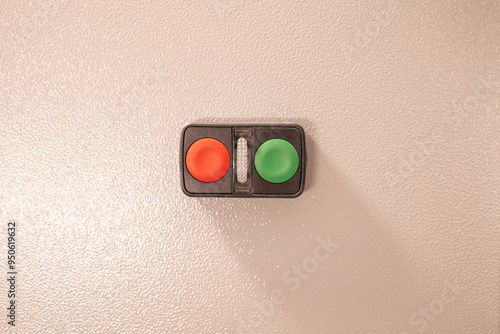 Start and stop button on an elctronic box. photo