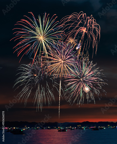 Obraz na płótnie Fireworks Against Evening Sky With Lights and Boats - 17-43 w salonie