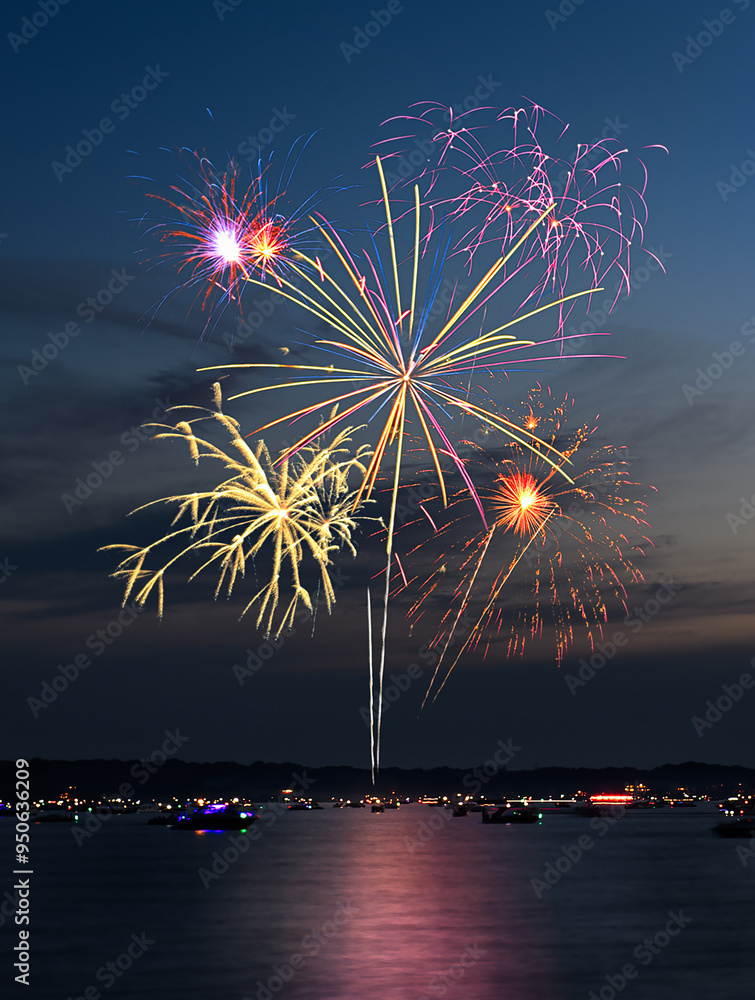 Fireworks Against Blue-Black with Shoreline and Reflections 14-30