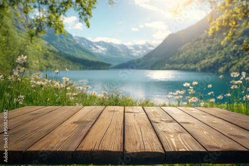 Wooden table with spring landscape, mountain and lake in background