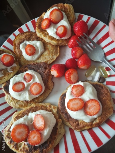 Healthy breakfast- pancakes with Greek yogurts and strawberries 