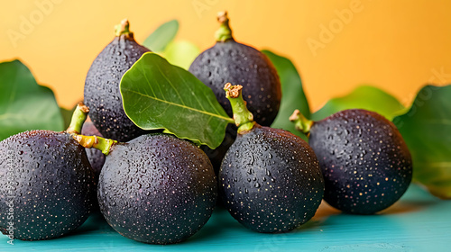 Ficus carica Black Mission Fig a different color background highlighting the unique color and texture of Black Mission figs ideal for vibrant designs photo