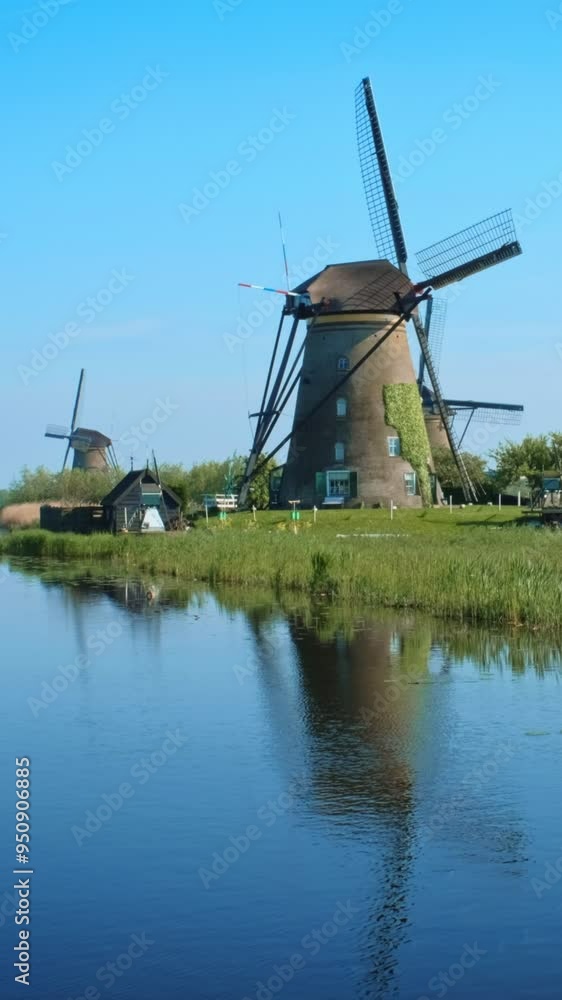 Netherlands rural landscape with windmills at famous tourist site Kinderdijk in Holland Netherlands rural landscape with windmills at famous tourist site Kinderdijk in Holland