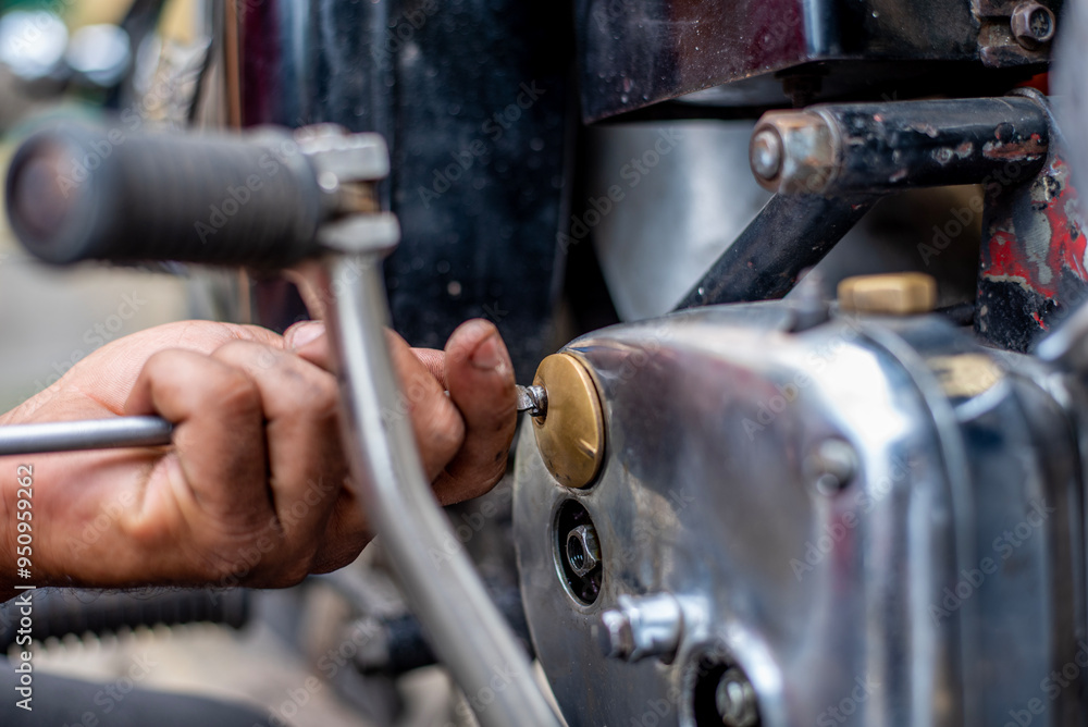 The motorcycle motorcycle engine was repaired by a mechanic. The motorcycle motorcycle engine was repaired by a mechanic.