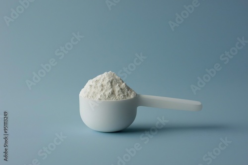 Protein powder in a scoop, workout supplement