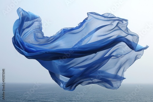 Flowing Blue Fabric Over the Ocean