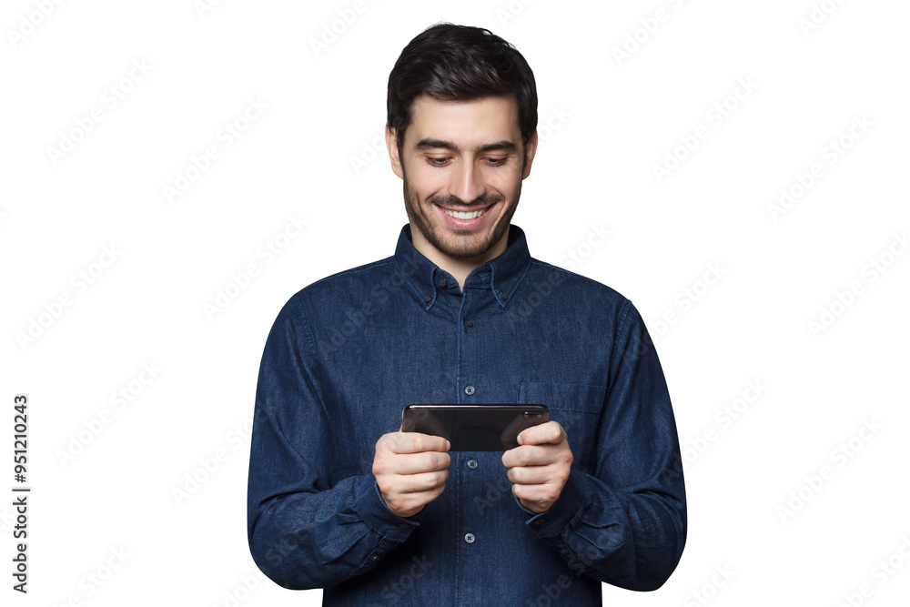 Handsome smiling man using his phone for gaming or watching viral video Handsome smiling man using his phone for gaming or watching viral video