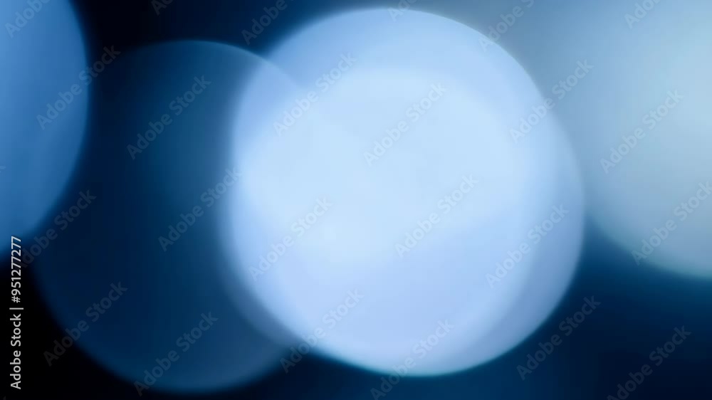 Exploring ethereal light patterns and reflections in serene blue tones Exploring ethereal light patterns and reflections in serene blue tones