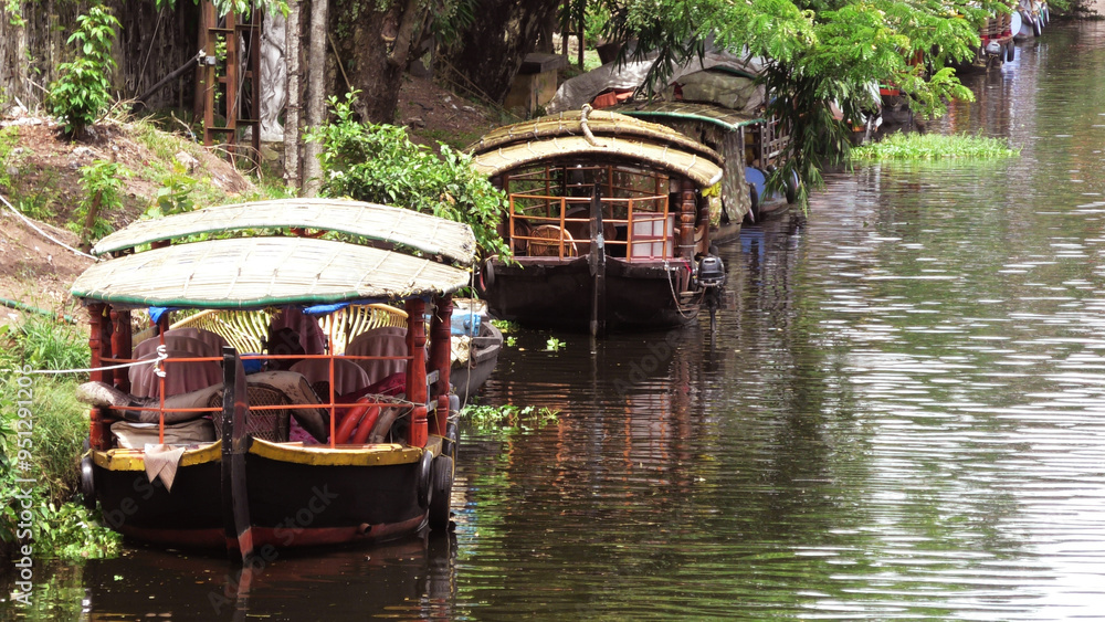 Shikara tourist boats parked in the canal at Alappuzha, Kerala, India