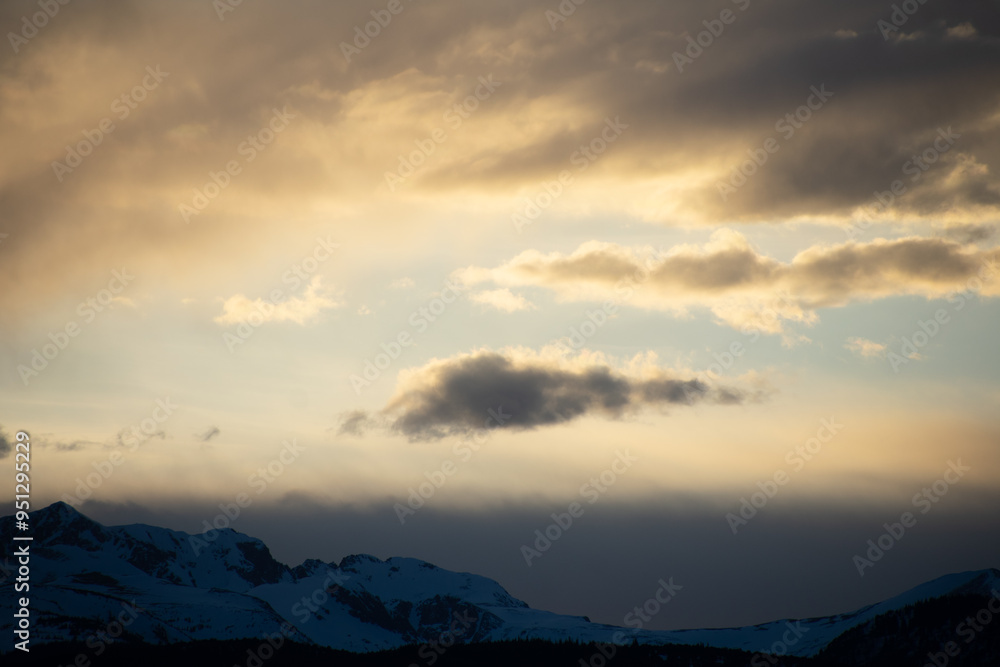 Sun setting Behind the Colorado Rocky Mountains Sun setting Behind the Colorado Rocky Mountains