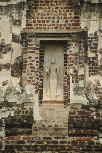 Wallpaper Mural Outdoor Ancient standing stucco Buddha at Main Pagoda ( Prang ) in Wat Ratchaburana ruins is considered a very important temple is Unesco World Heritage Site in Ayutthaya Historical Park in Thailand. Torontodigital.ca