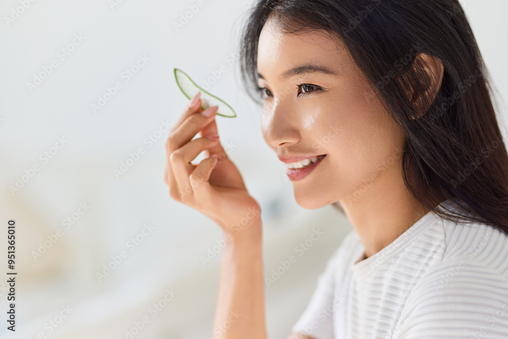 Natural Skincare Routine. Woman Applying Fresh Cucumber Slice To Skin, Embracing Natural Beauty And Skincare Routine. Highlighting Health And Wellness. Natural Skincare Routine. Woman Applying Fresh Cucumber Slice To Skin, Embracing Natural Beauty And Skincare Routine. Highlighting Health And Wellness.