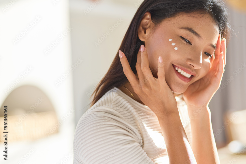 Face Care. Woman Applying Skincare Cream Embracing Self-Care Routine. Concept of Beauty, Relaxation, Personal Wellness, Healthy Skin Face Care. Woman Applying Skincare Cream Embracing Self-Care Routine. Concept of Beauty, Relaxation, Personal Wellness, Healthy Skin