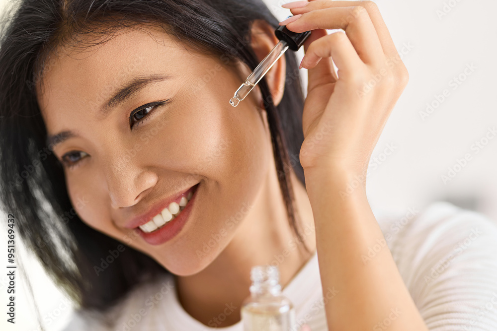 Skin Care Beauty. Woman Applying Face Serum With Dropper, Smiling, And Enjoying Healthy Skincare Routine, Highlighting Freshness And Beauty Trends. Skin Care Beauty. Woman Applying Face Serum With Dropper, Smiling, And Enjoying Healthy Skincare Routine, Highlighting Freshness And Beauty Trends.