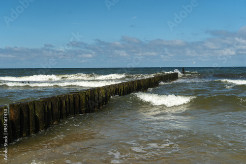 waterbreak and wavy sea photo