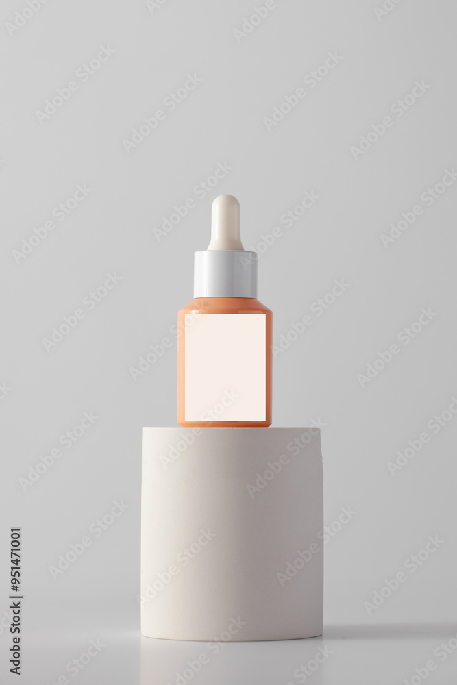 Dropper with anti-aging serum on the podium. Cosmetics, skin care. Dropper with anti-aging serum on the podium. Cosmetics, skin care.