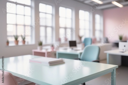 Empty blue office interior with modern furniture and large windows