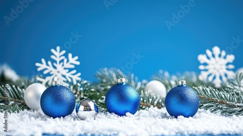 blue christmas background with snowflakes and christmas balls. Copy space backgrounds