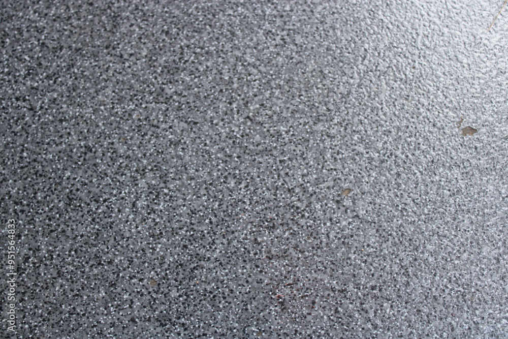Close-up of a textured grey surface. Close-up of a textured grey surface.