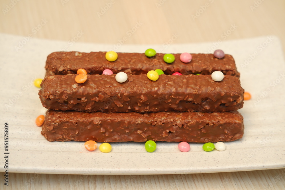Chocolate wafers on a white plate, close-up Chocolate wafers on a white plate, close-up