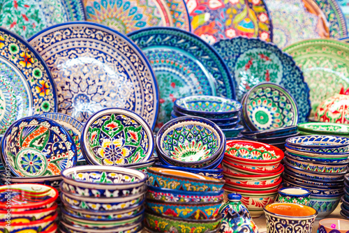 Multicolored ceramic dishes with oriental ornaments at the Siab Bazaar.