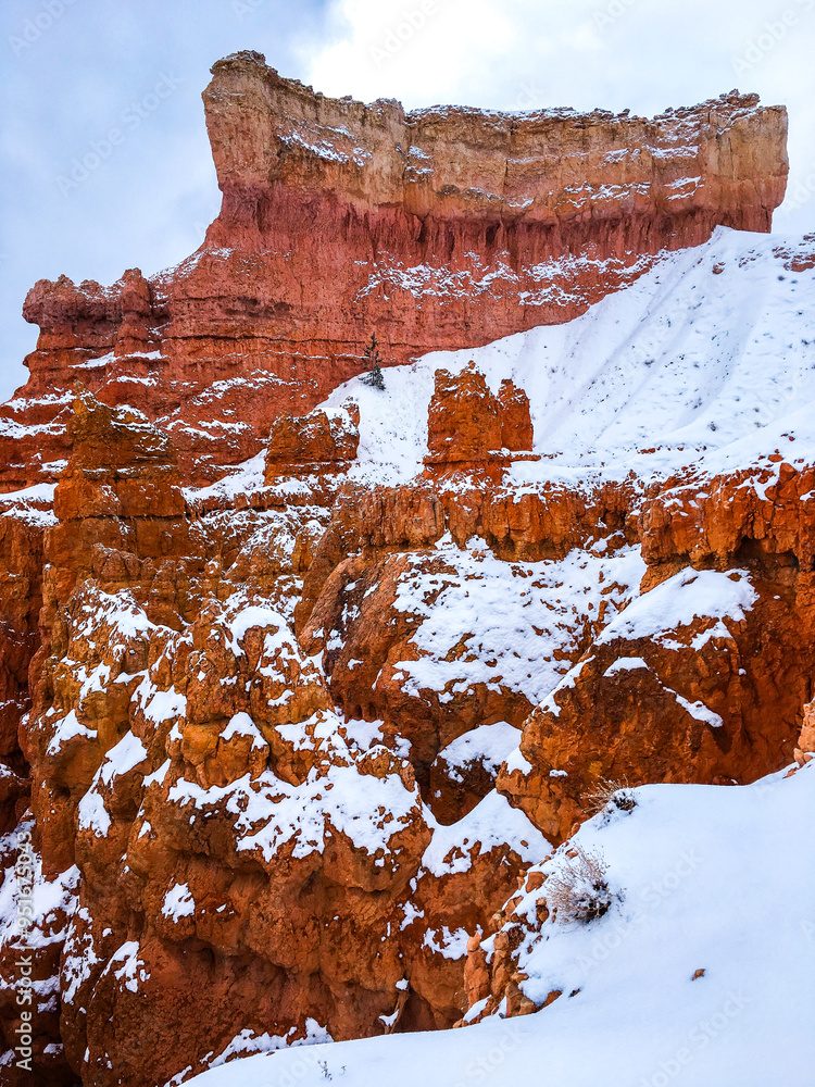 Snow scene colorful cliffs with red rock and stone in Bryce Canyon National Park Snow scene colorful cliffs with red rock and stone in Bryce Canyon National Park