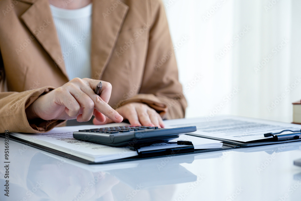 Real estate agent calculating house price for buyer. Real estate agent calculating house price for buyer.