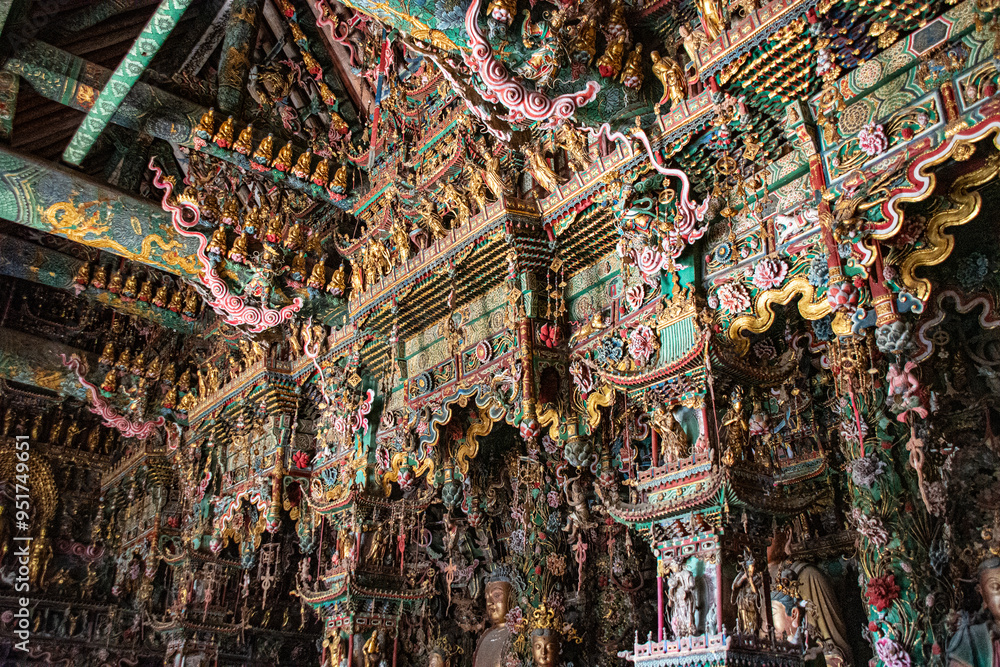 Fototapeta premium Gilded sculptures & painted statues art of the Ming and Qing Dynasties in Minor Western Heaven Mahavira Temple, Linfen, Shanxi Province, China - a famous ancient building in the game Black Myth Wukong