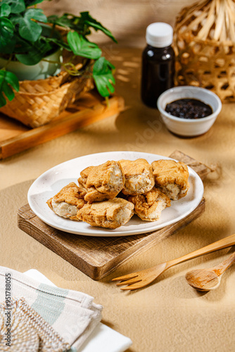 Tahu Walik, Inside Out Crispy Tofu Stuffed is a processed tofu snack fried in starch and other ingredients with Meatball Tahu Walik also known as Tahu Bakso photo