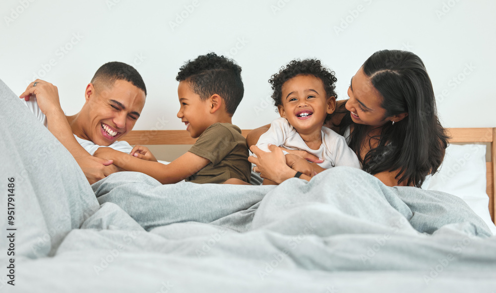 Relax, happy family and play in bedroom, laughing and brothers bonding together in home. Morning, mother and father tickle kids for funny game, love and parents hug excited boys for support in bed Relax, happy family and play in bedroom, laughing and brothers bonding together in home. Morning, mother and father tickle kids for funny game, love and parents hug excited boys for support in bed