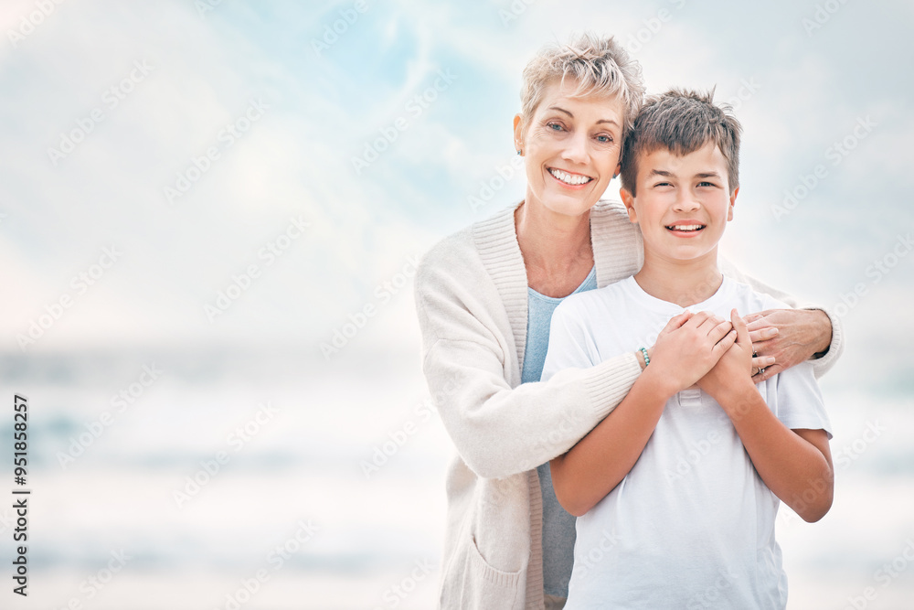 Obraz premium Hug, portrait and granny with grandson on beach together for holiday, travel or vacation. Love, mockup space or smile with senior woman and boy child embracing outdoor for summer bonding or wellness