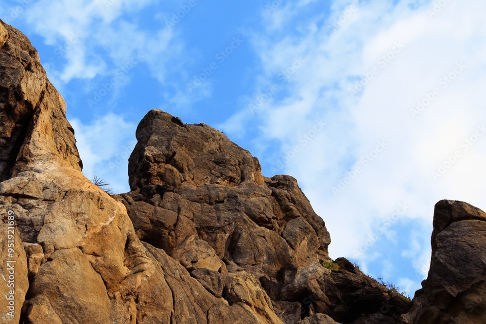 Rocks stones in nature against a blue sky. sunrise nepal morning concept. rocks and yellow and blue sky in nature. rocks and stones in nature in yellow and blue with a blue lifestyle sky. Rocks stones in nature against a blue sky. sunrise nepal morning concept. rocks and yellow and blue sky in nature. rocks and stones in nature in yellow and blue with a blue lifestyle sky.