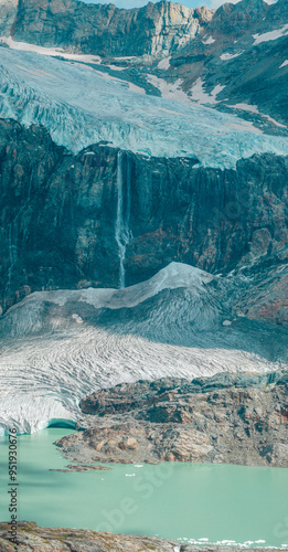 Aerial view of the Fellaria glacier in Valmalenco, Sondrio, Lombardy. Italy. Ice cliff, rock face with waterfalls and lake. Marson glaciological trail. Climate change, melting glaciers photo