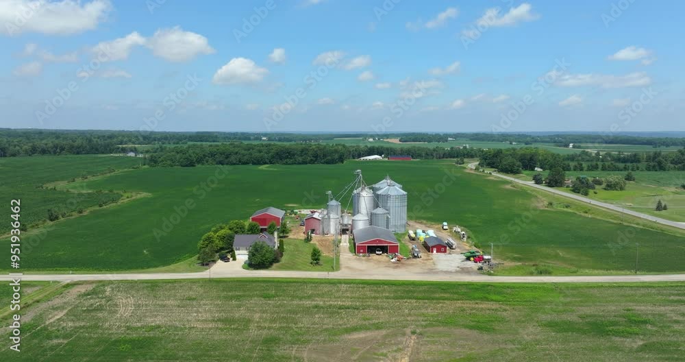 American agricultural landscape. Farm building and grain bins in rural Ohio, USA American agricultural landscape. Farm building and grain bins in rural Ohio, USA