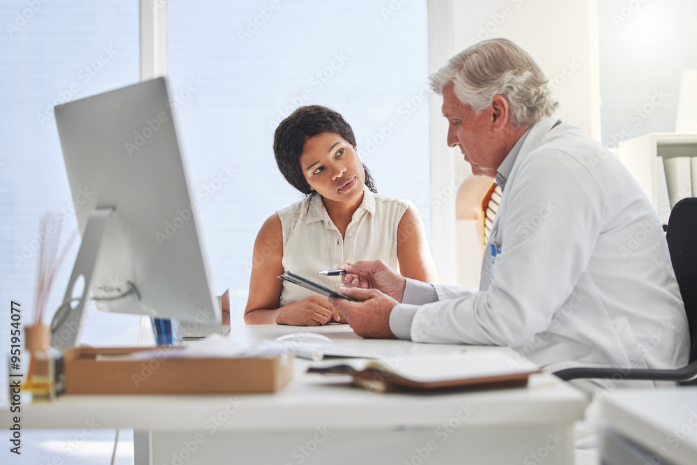 Clipboard, computer and doctor talking to patient in office at hospital for appointment or consulting. Desk, healthcare and insurance with medical professional in clinic checkup to explain diagnosis Clipboard, computer and doctor talking to patient in office at hospital for appointment or consulting. Desk, healthcare and insurance with medical professional in clinic checkup to explain diagnosis
