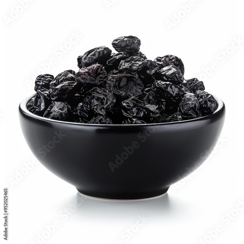 Medium shot of bowl of Dried Prune, isolated on a white background 