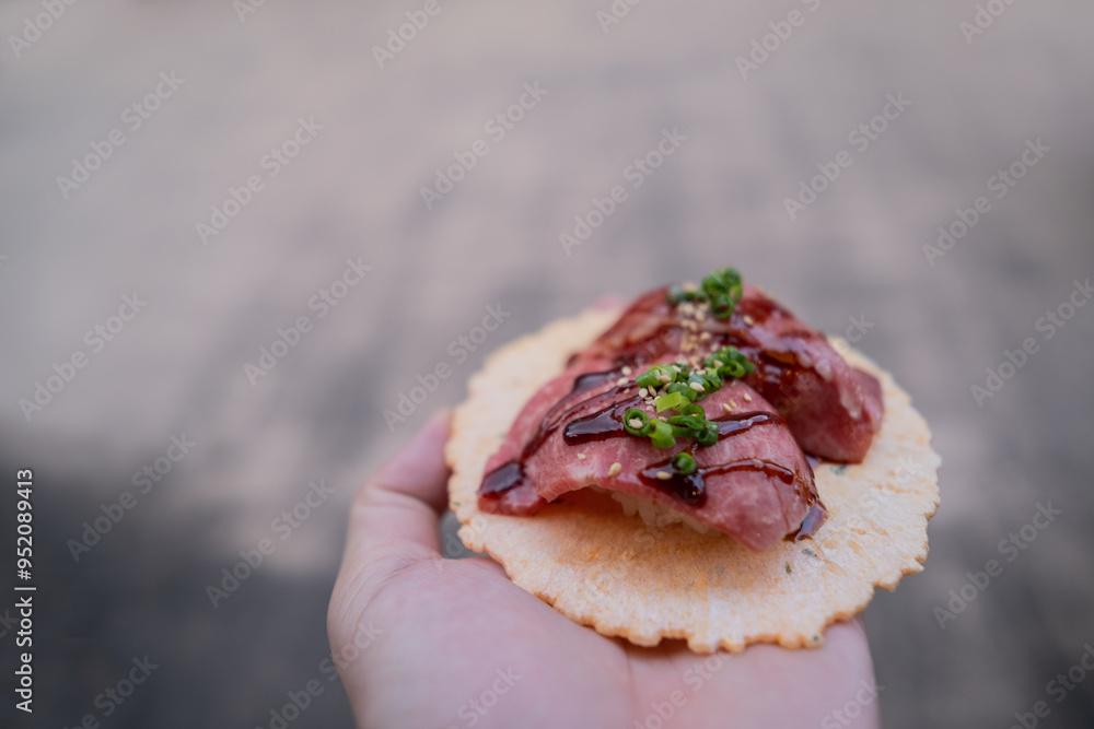 Wagyu beef sushi with Japanese sauce